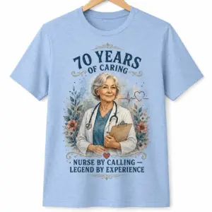 Light blue nurse appreciation T-shirt with 70 Years of Caring text, older nurse portrait, stethoscope, florals, and Legend by Experience wording.