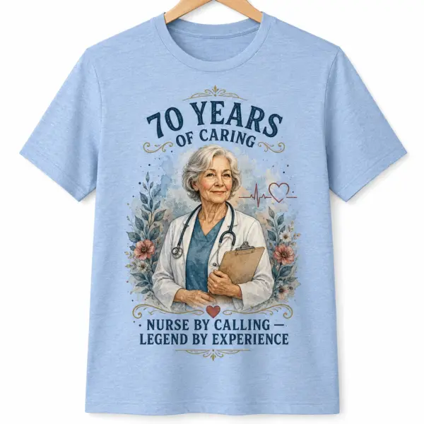 Light blue nurse appreciation T-shirt with 70 Years of Caring text, older nurse portrait, stethoscope, florals, and Legend by Experience wording.