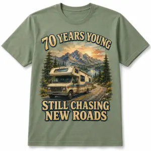 70th birthday RV T-shirt front view with 70 Years Young Still Chasing New Roads mountain road trip design
