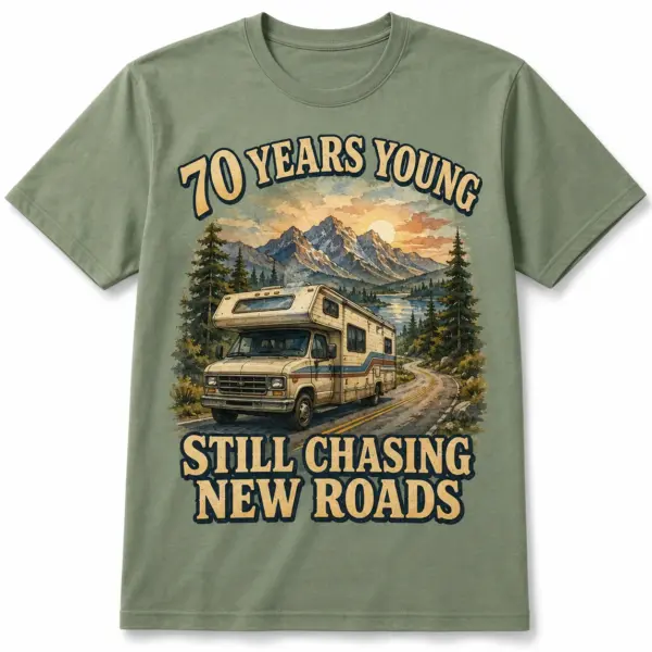 70th birthday RV T-shirt front view with 70 Years Young Still Chasing New Roads mountain road trip design