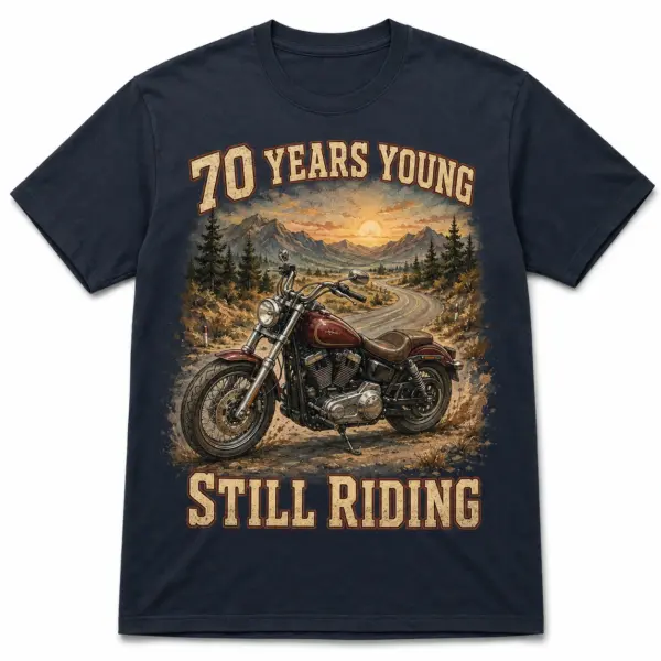 Front view of 70 Years Young Still Riding 70th birthday motorcycle T-shirt with vintage cruiser road artwork