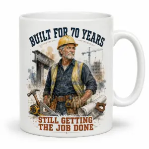 White ceramic mug with construction worker 70th birthday artwork reading Built for 70 Years and Still Getting the Job Done